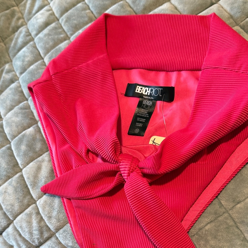 Hot pink BeachRiot bikini bottoms from FP